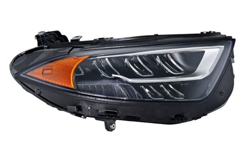 HELLA Headlight Assembly 015619661