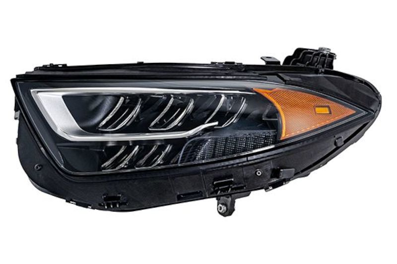 HELLA Headlight Assembly 015619851